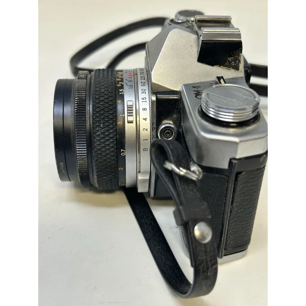 Olympus OM-1 35mm Film Camera w/ F.Zuiko 50mm f/1.8 + Fotomat 28–80mm Lens